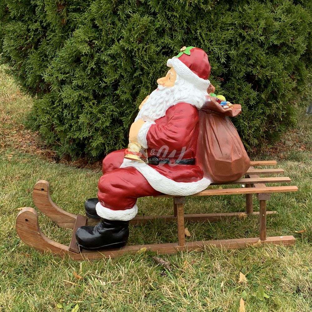 Weihnachtsmann / Nikolaus sitzend 57 cm auf Schlitten 70 cm | Weihnachtsmann Figuren | Weihnachtsfiguren | Produkte